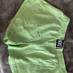 Neon green Nike shorts